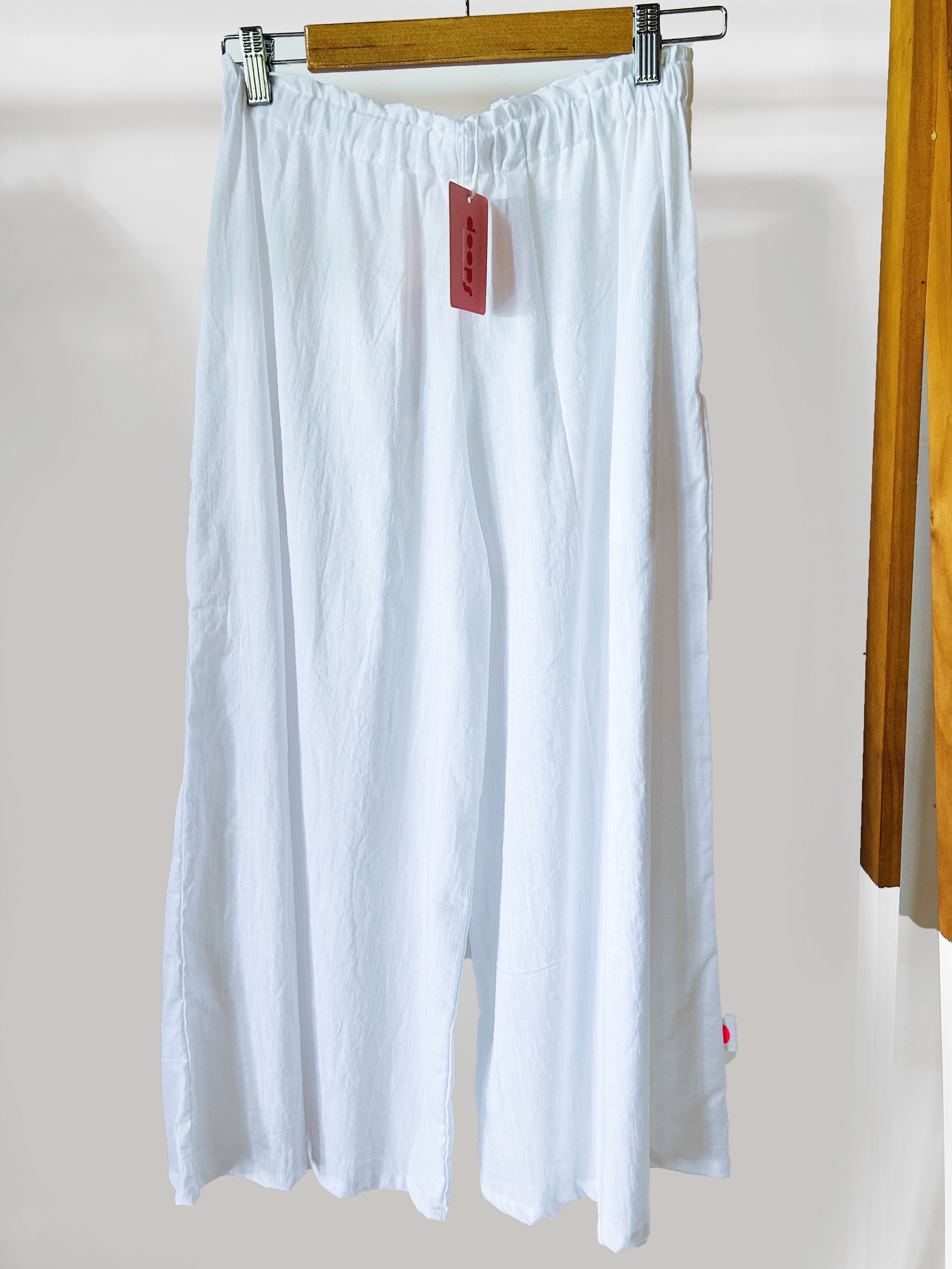 White cotton linen pants with flower at bottom /sample