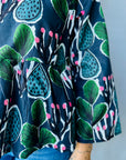 Coral Cactus navy pleated cotton top